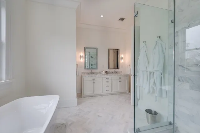 a living room with a flat screen tv and a window