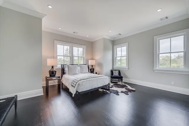 a bathroom with double vanity sink and a mirror