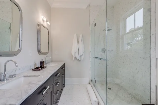 a bedroom with bed and window