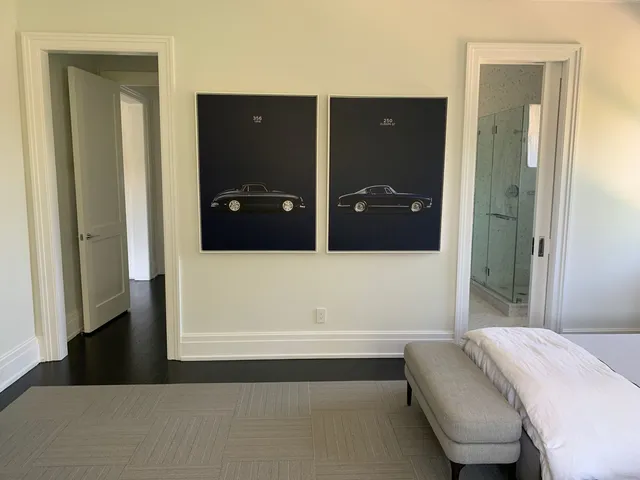 a bathroom with a sink a light fixture and a mirror