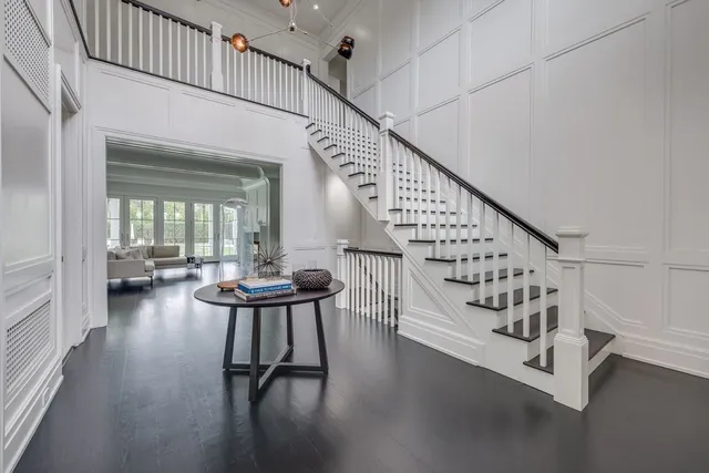 a view of entryway with livingroom and wooden floor