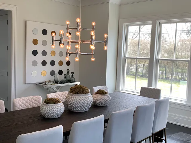 a living room with furniture and gym equipment