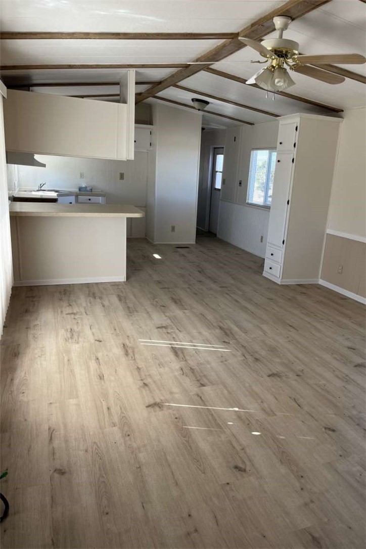 1582 Locust Road Pinon Hills, CA 92372 - Photo 2 of 6 a view of a kitchen with a dishwasher and cabinets