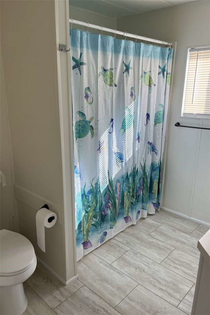 1582 Locust Road Pinon Hills, CA 92372 - Photo 5 of 6 a bathroom with a shower and a toilet