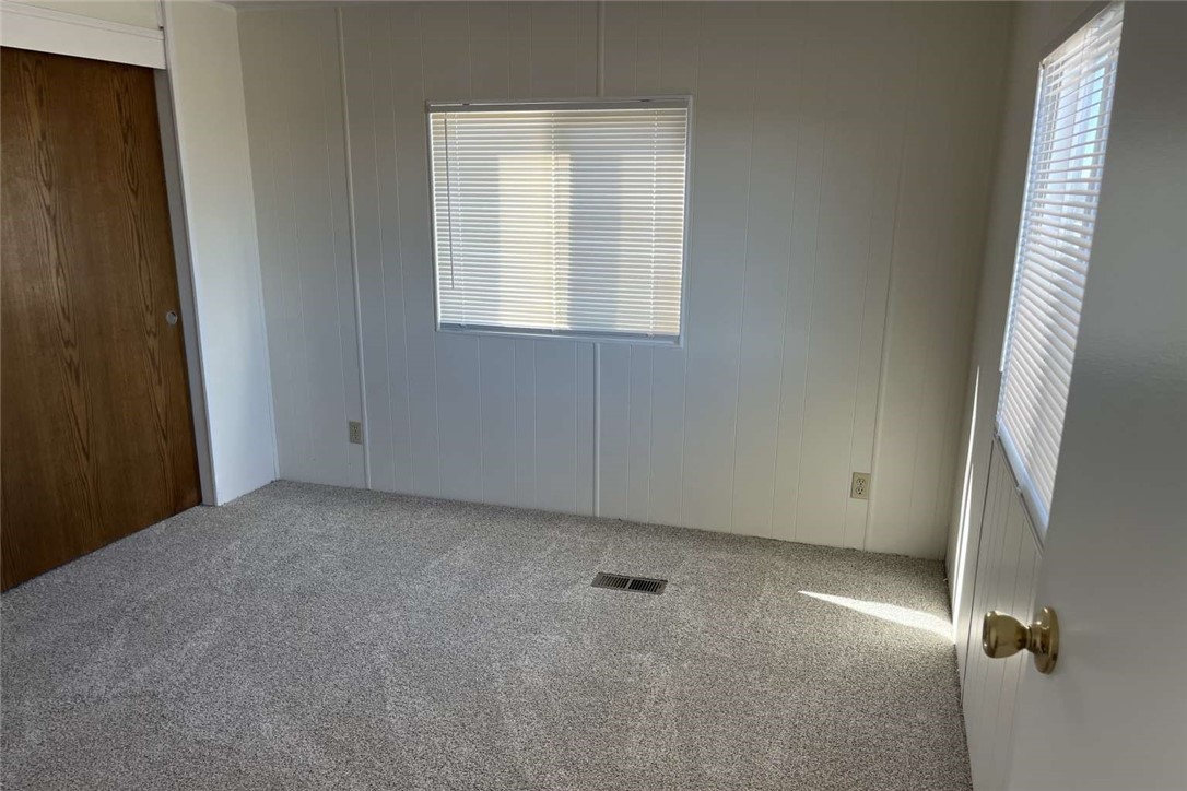 1582 Locust Road Pinon Hills, CA 92372 - Photo 6 of 6 an empty room with windows