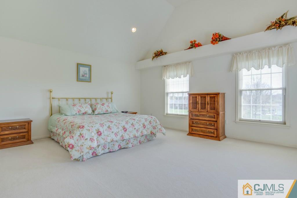 85 Sharon Road Robbinsville, NJ 08691 - Photo 11 of 25 a bedroom with a bed and window