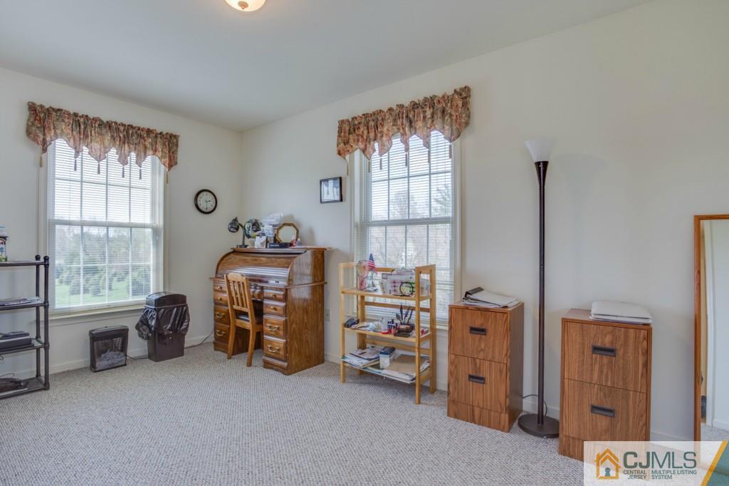 85 Sharon Road Robbinsville, NJ 08691 - Photo 18 of 25 a bedroom with furniture and a large window