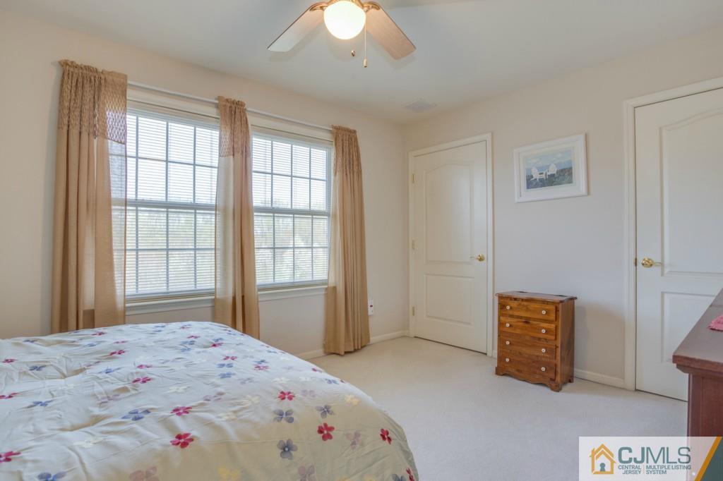 85 Sharon Road Robbinsville, NJ 08691 - Photo 20 of 25 a bedroom with a bed and a window