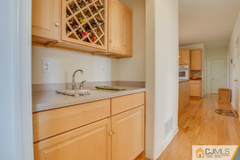 85 Sharon Road Robbinsville, NJ 08691 - Photo 24 of 25 a bathroom with a sink and a mirror