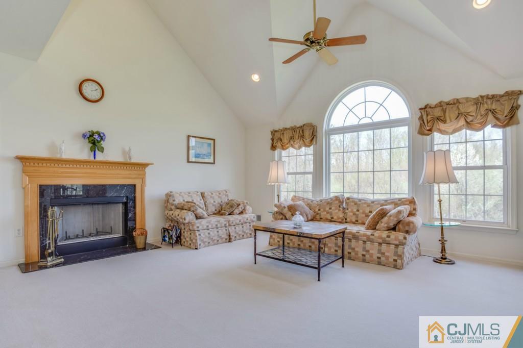 85 Sharon Road Robbinsville, NJ 08691 - Photo 6 of 25 a living room with furniture and a fireplace