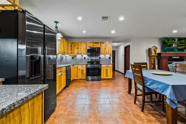 a view of a dining room with furniture