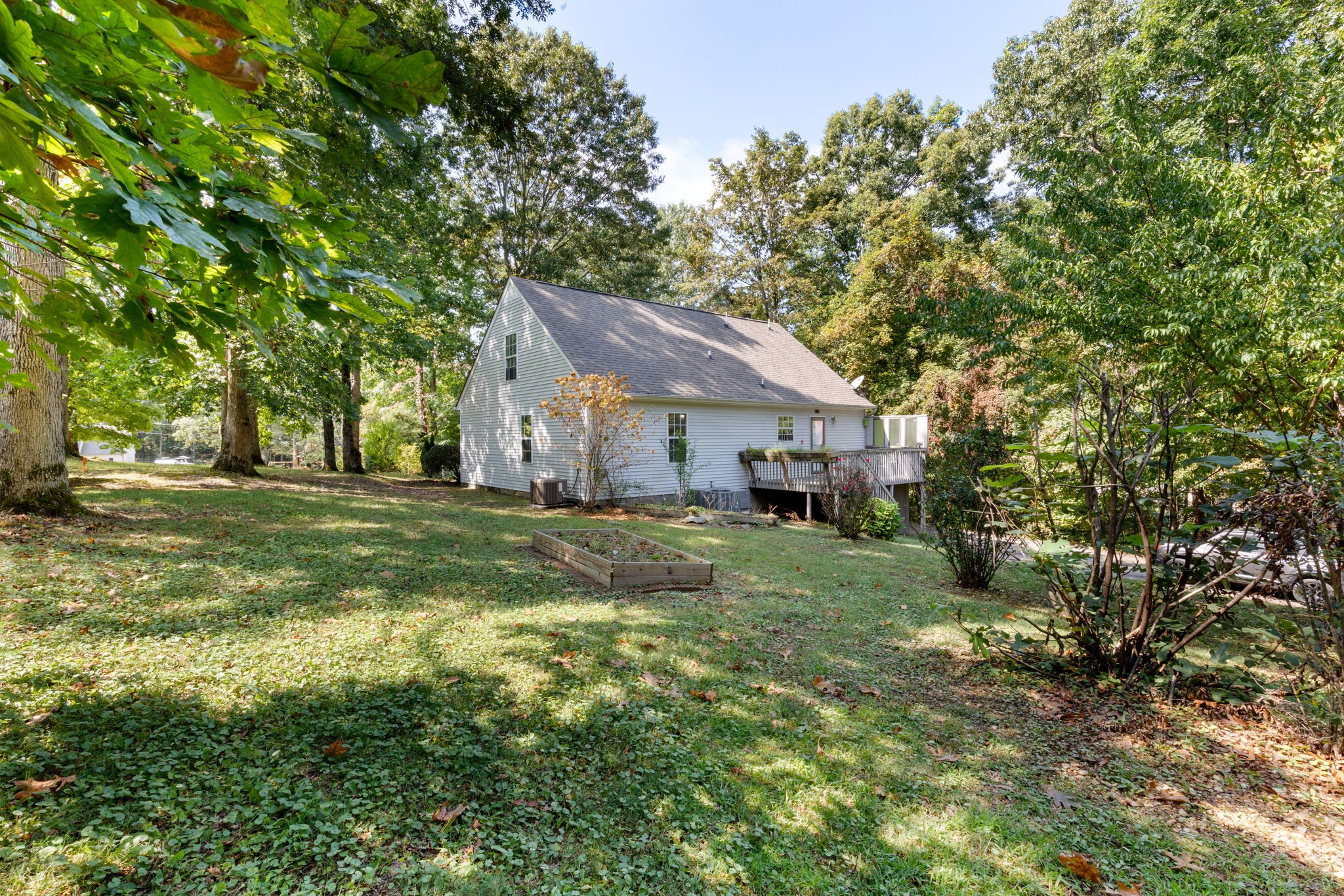 137 Gaskins Road Dickson, TN 37055 - Photo 12 of 58 a view of house with backyard