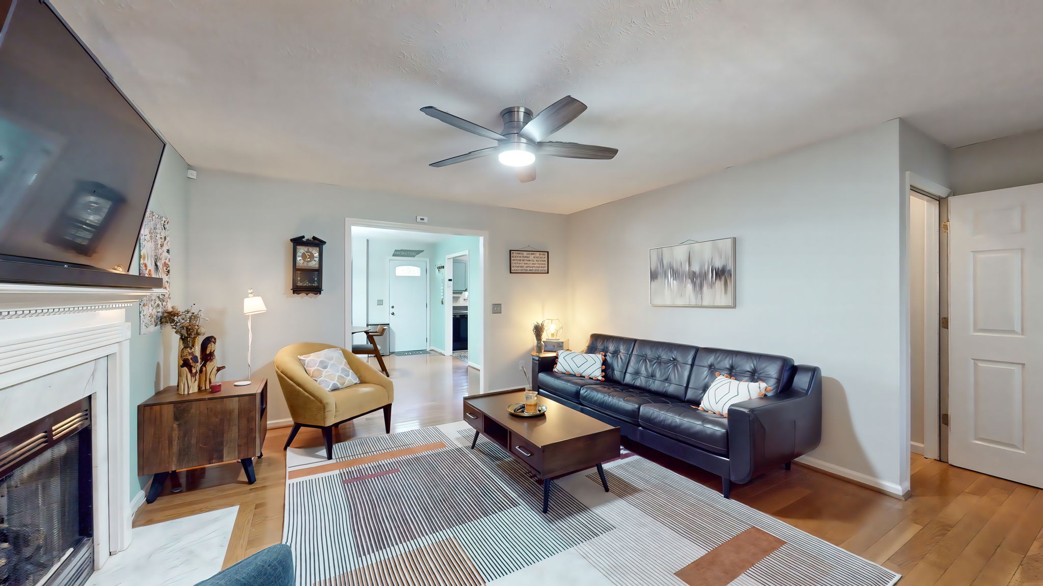 137 Gaskins Road Dickson, TN 37055 - Photo 15 of 58 a living room with furniture and a fireplace