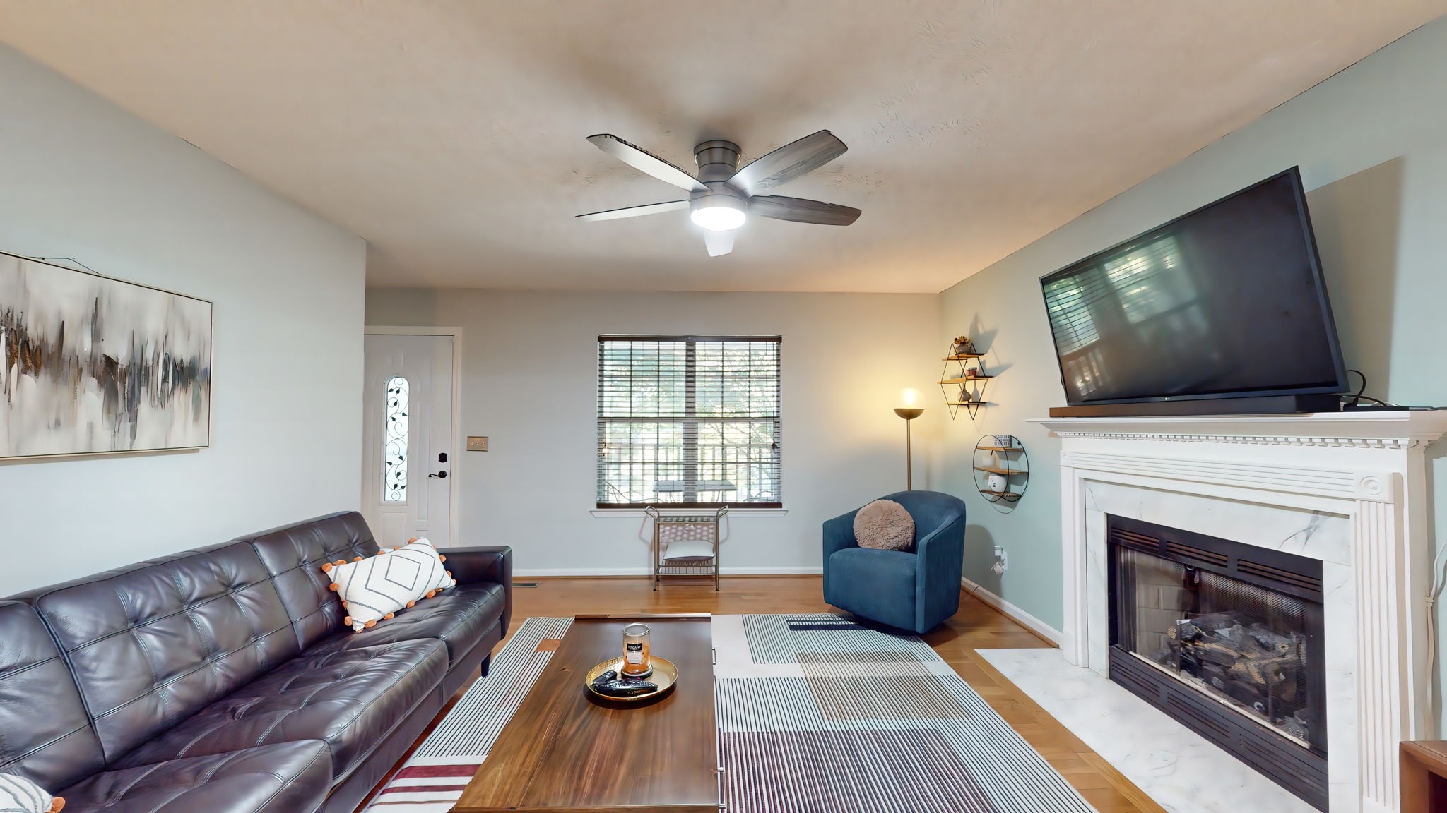 137 Gaskins Road Dickson, TN 37055 - Photo 16 of 58 a living room with furniture and a fireplace