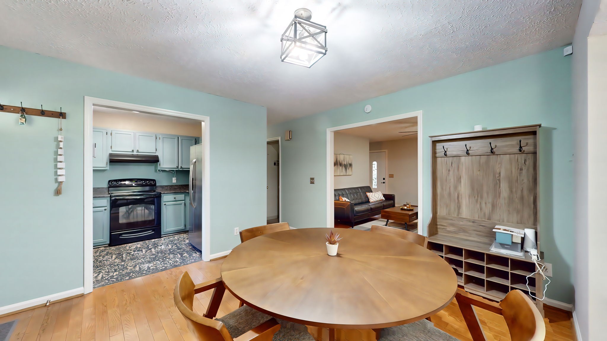 137 Gaskins Road Dickson, TN 37055 - Photo 21 of 58 a view of a dining room with furniture window and wooden floor