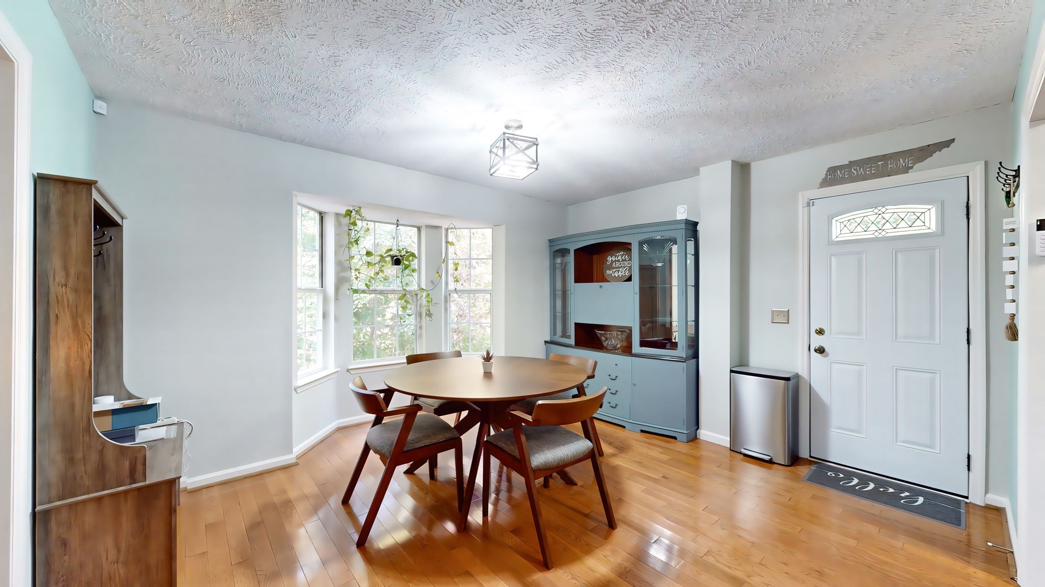 137 Gaskins Road Dickson, TN 37055 - Photo 23 of 58 a view of a dining room with furniture window and wooden floor