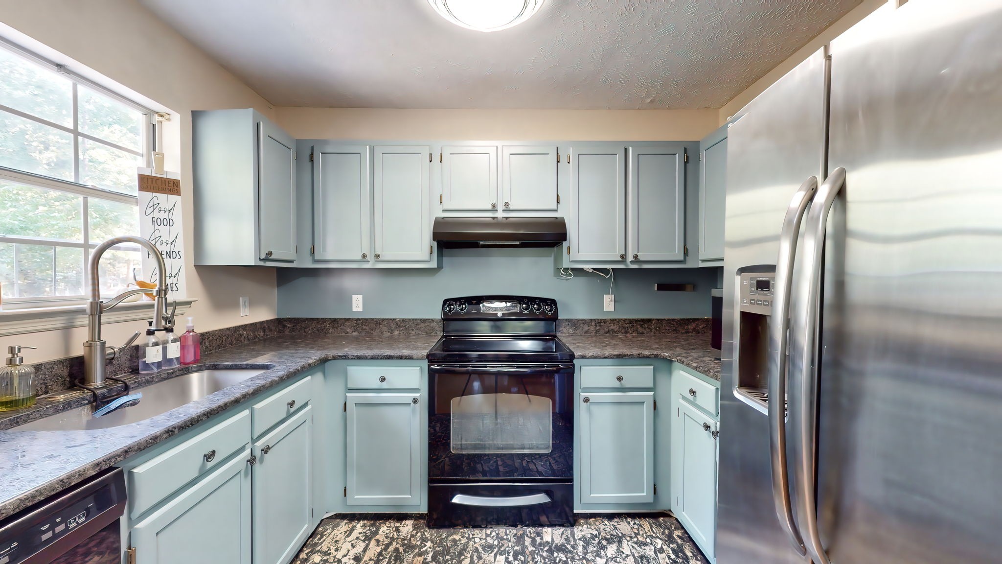 137 Gaskins Road Dickson, TN 37055 - Photo 24 of 58 a kitchen with a stove and a refrigerator