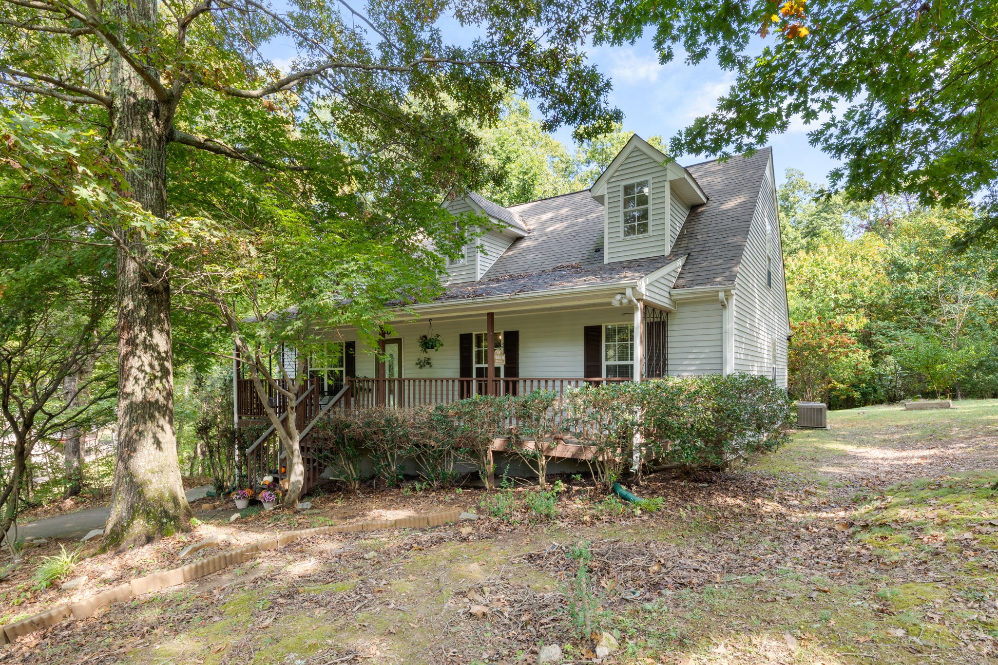 137 Gaskins Road Dickson, TN 37055 - Photo 3 of 58 a view of a house with a tree and a yard