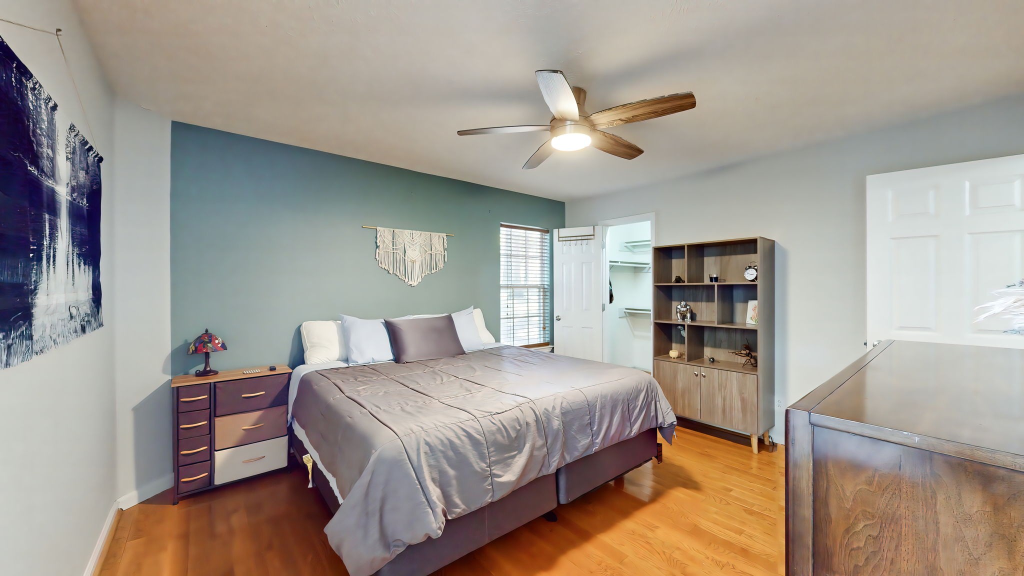 137 Gaskins Road Dickson, TN 37055 - Photo 33 of 58 a bedroom with a bed and a book shelf