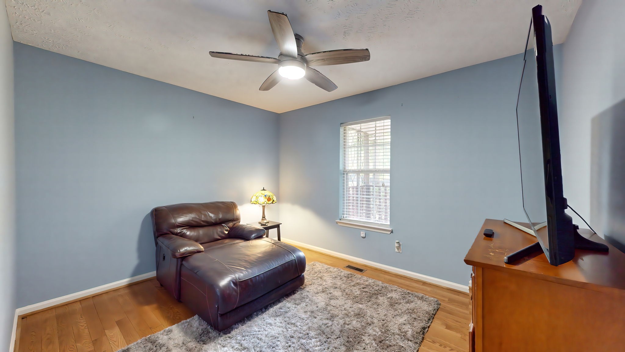 137 Gaskins Road Dickson, TN 37055 - Photo 39 of 58 a living room with furniture and a window