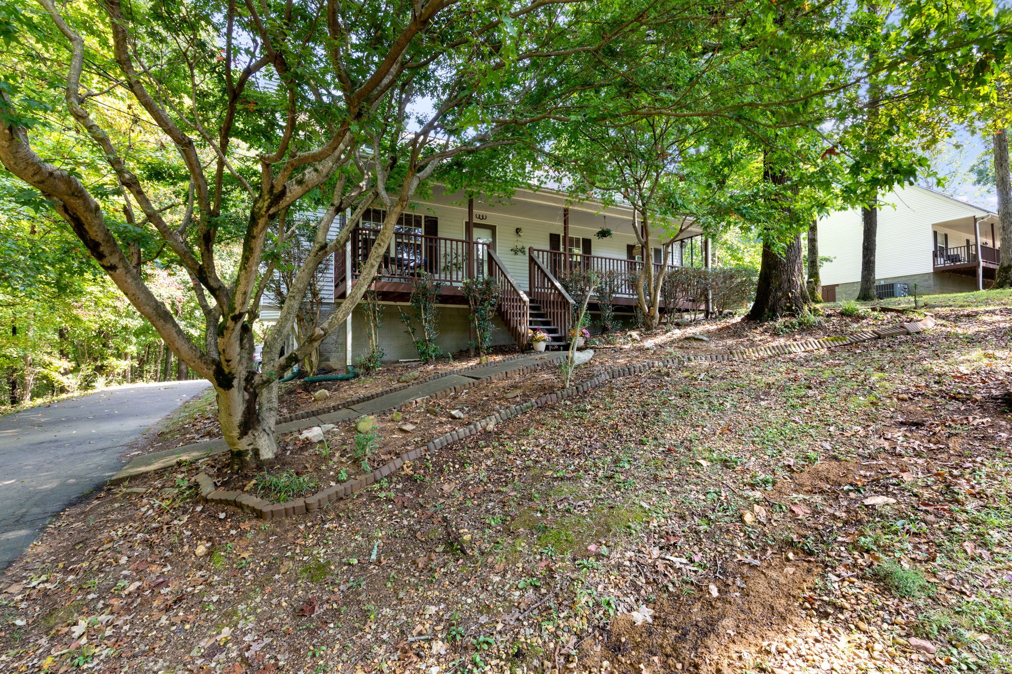 137 Gaskins Road Dickson, TN 37055 - Photo 4 of 58 a view of a house with a tree
