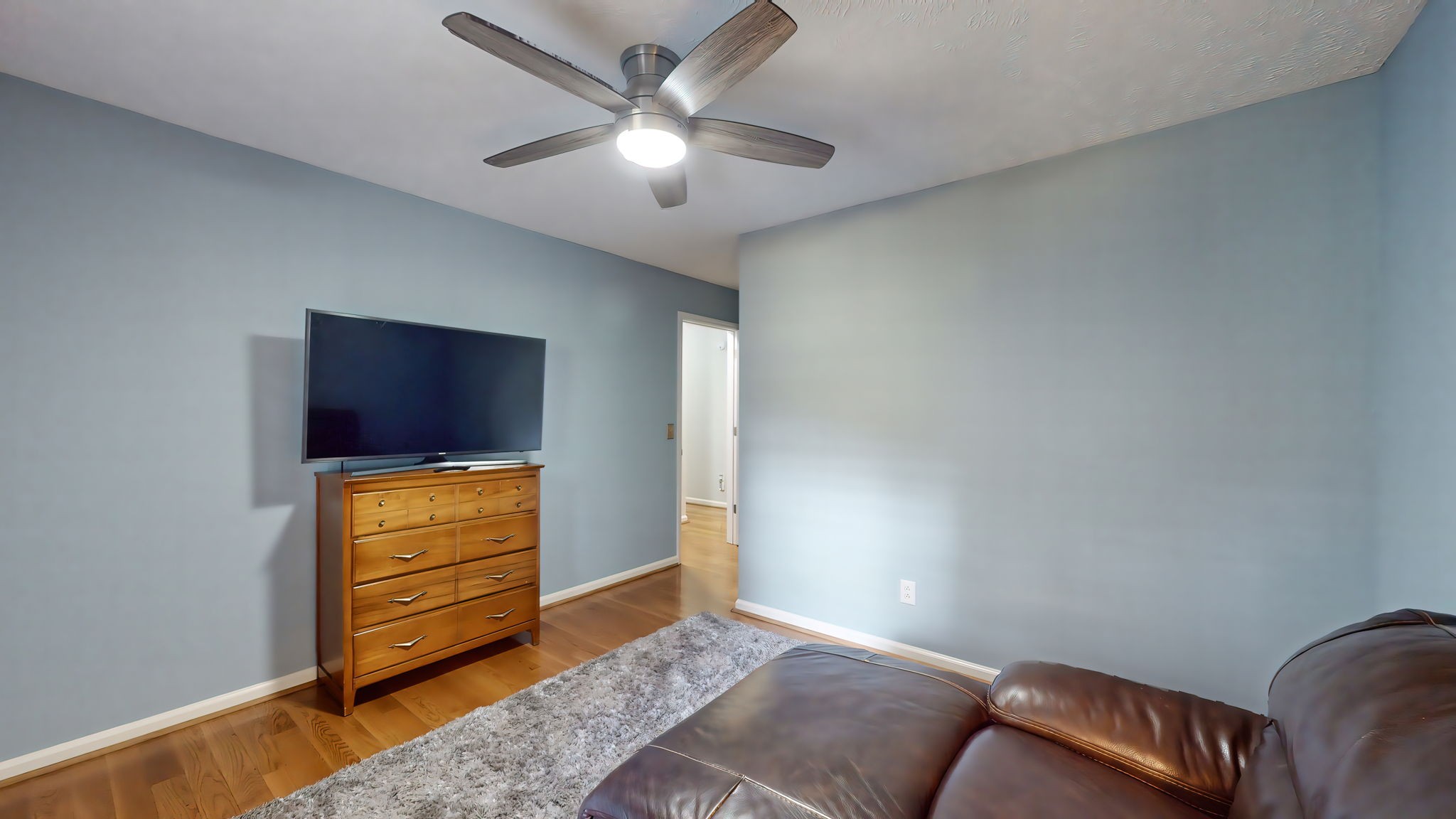 137 Gaskins Road Dickson, TN 37055 - Photo 41 of 58 a living room with furniture and a flat screen tv