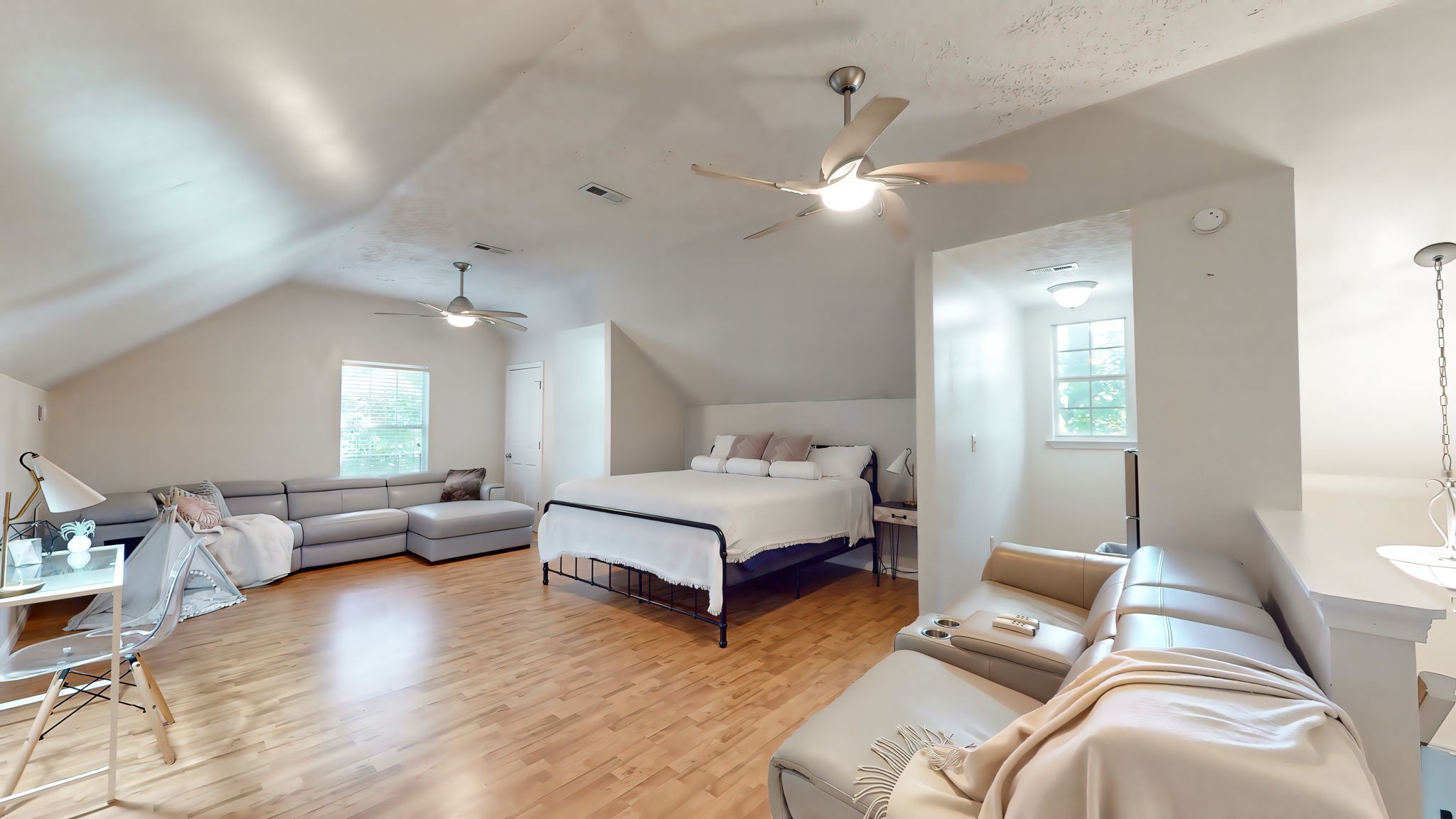 137 Gaskins Road Dickson, TN 37055 - Photo 44 of 58 a spacious bedroom with a bed window and couch