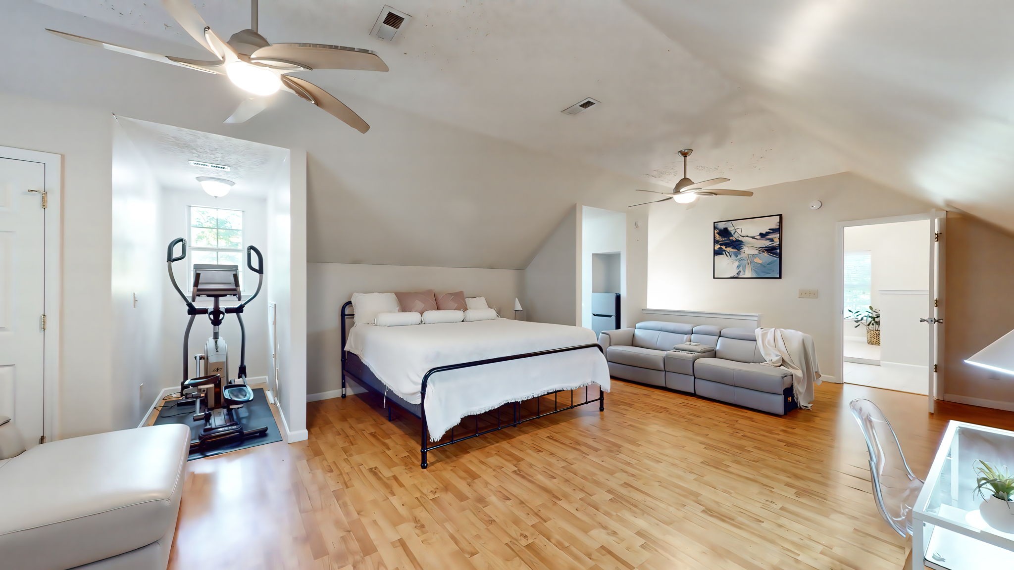 137 Gaskins Road Dickson, TN 37055 - Photo 45 of 58 a bedroom with a bed and wooden floor