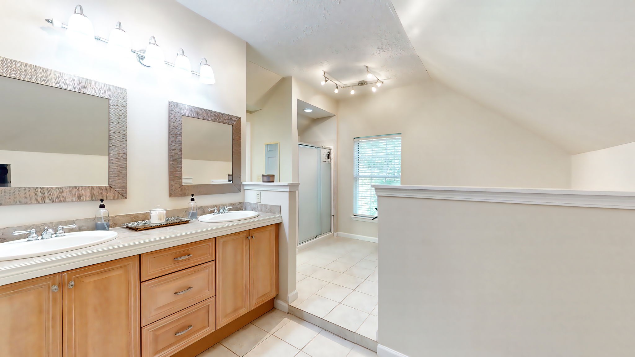 137 Gaskins Road Dickson, TN 37055 - Photo 48 of 58 a spacious bathroom with a double vanity sink and a mirror