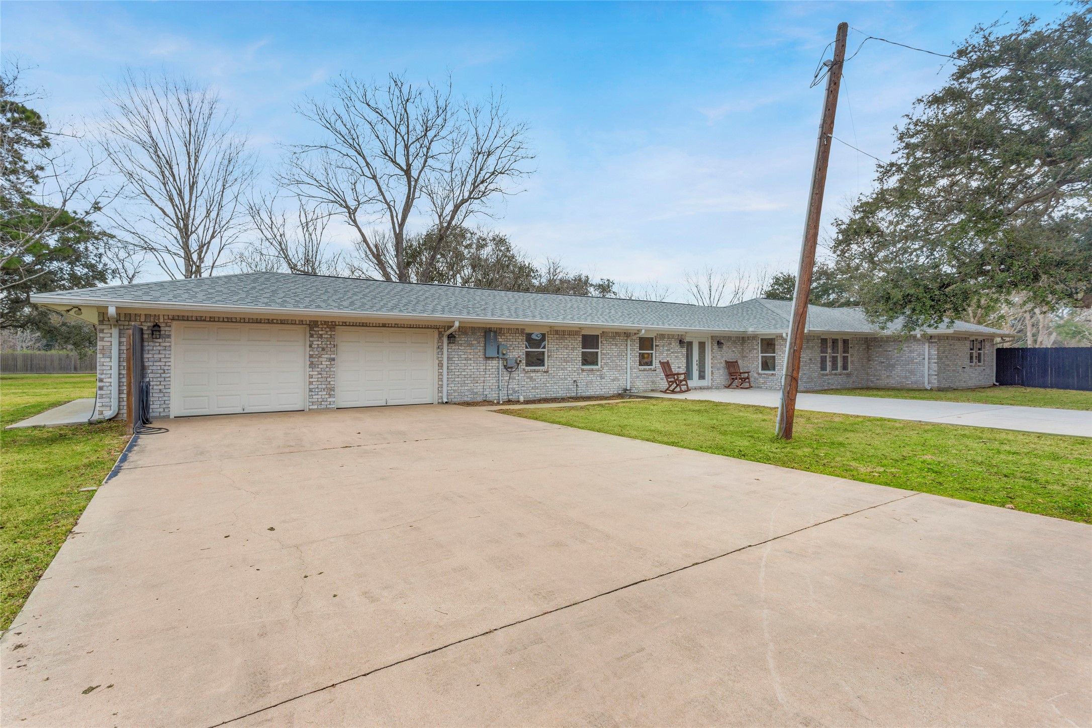 a view of house with yard