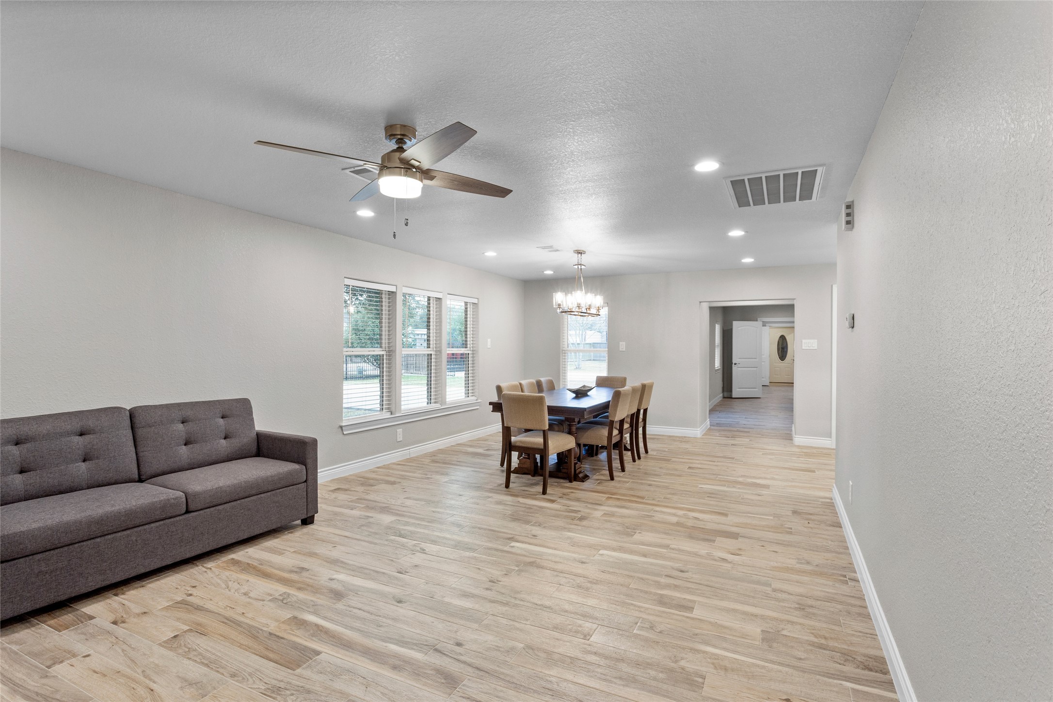13800 West 6th Street Santa Fe, TX 77517 - Photo 18 of 35 a living room with furniture and a large window