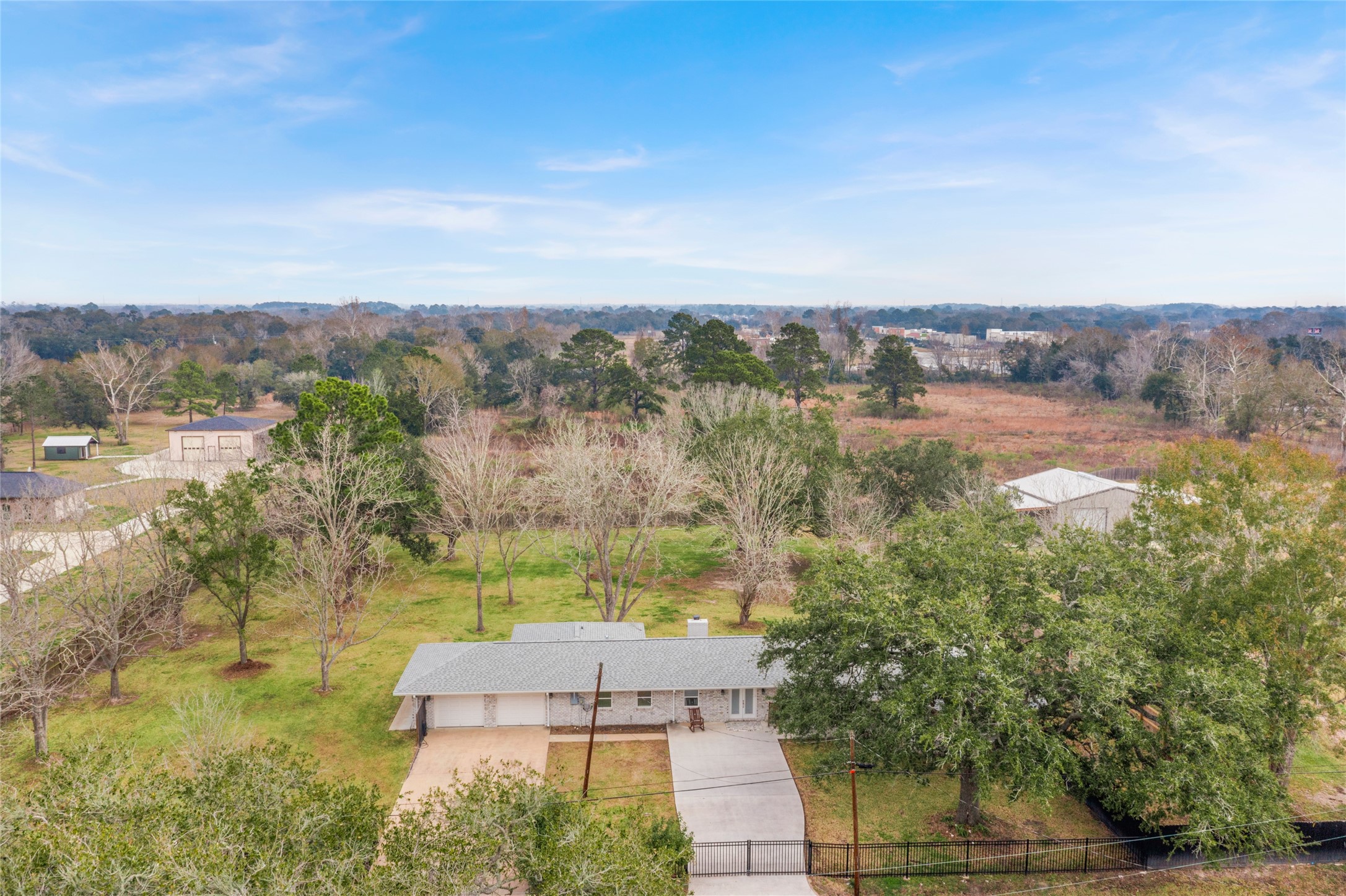 13800 West 6th Street Santa Fe, TX 77517 - Photo 5 of 35 an aerial view of a house with a yard
