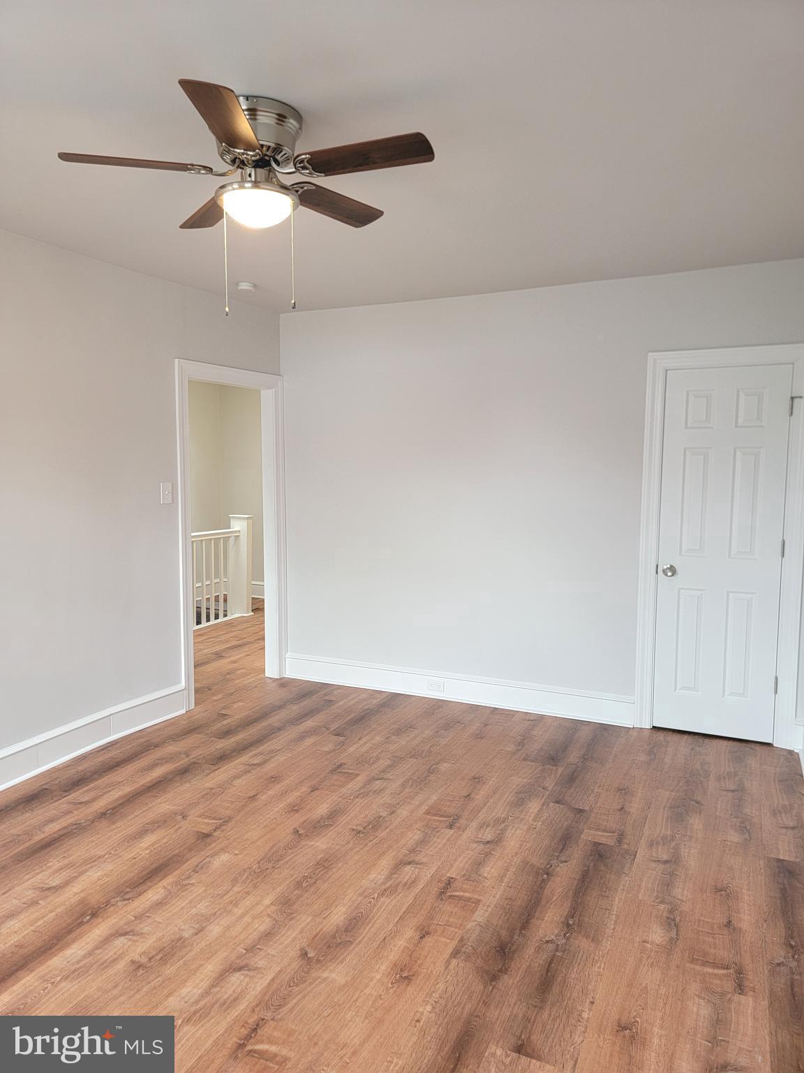 56 East Spring Avenue, Unit 2 Ardmore, PA 19003 - Photo 11 of 12 a view of an empty room with wooden floor