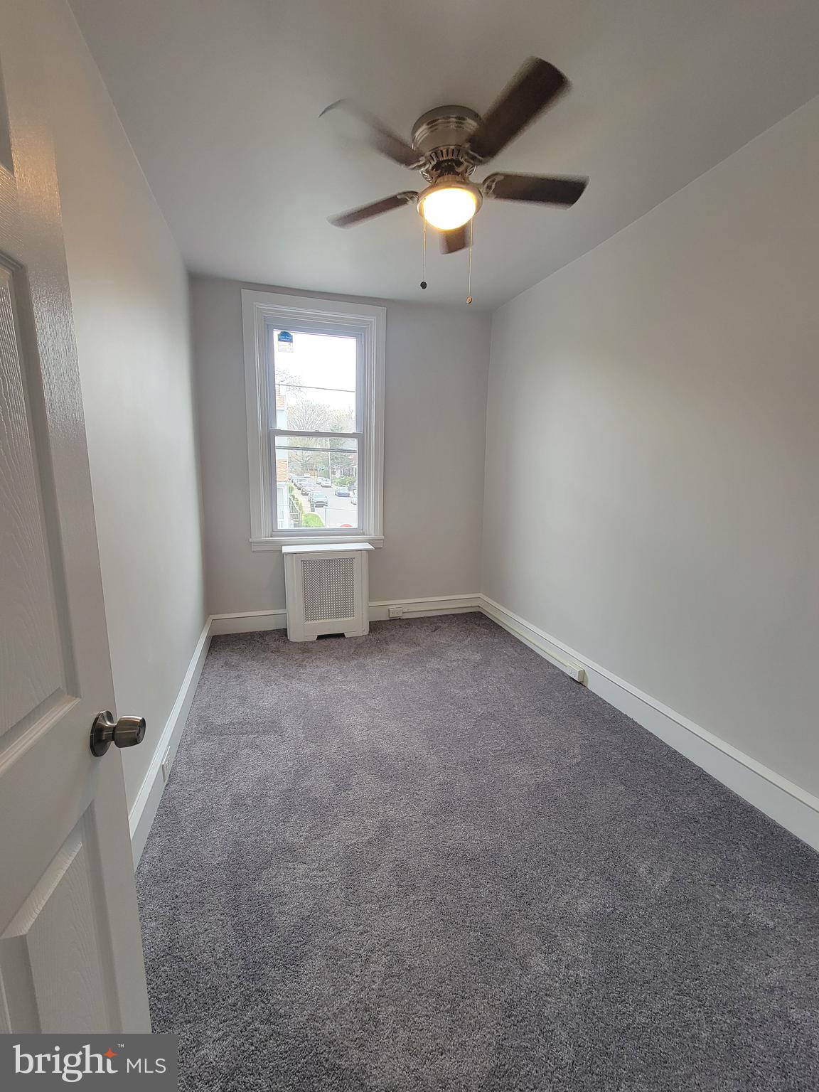 56 East Spring Avenue, Unit 2 Ardmore, PA 19003 - Photo 9 of 12 an empty room with windows