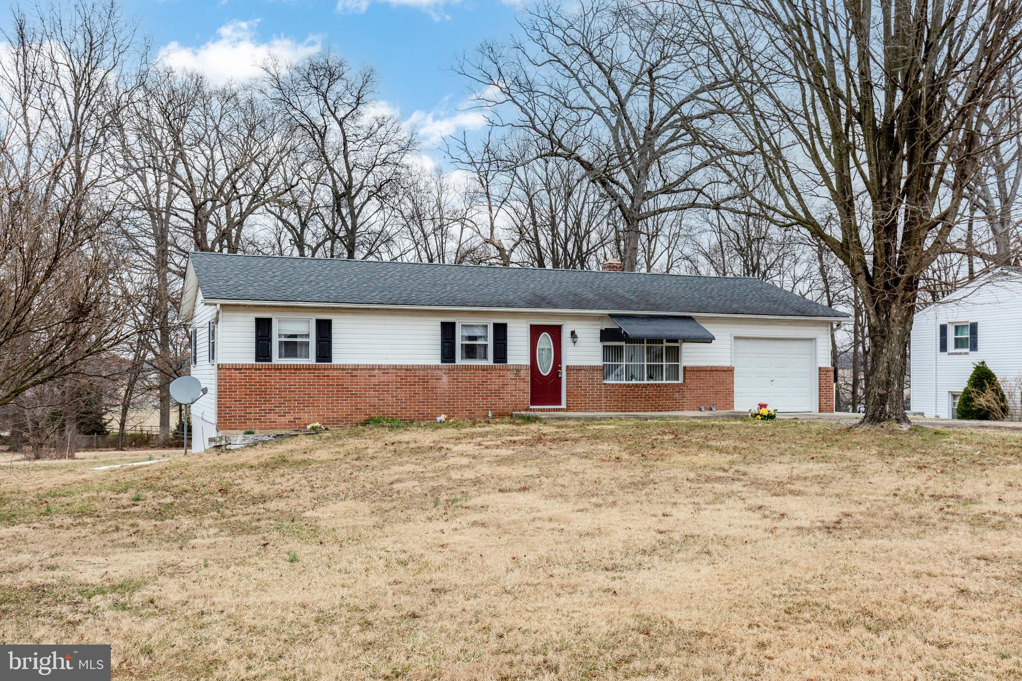 529 Key Heights Road Union Bridge, MD 21791 - Photo 3 of 45 a front view of a house with a yard