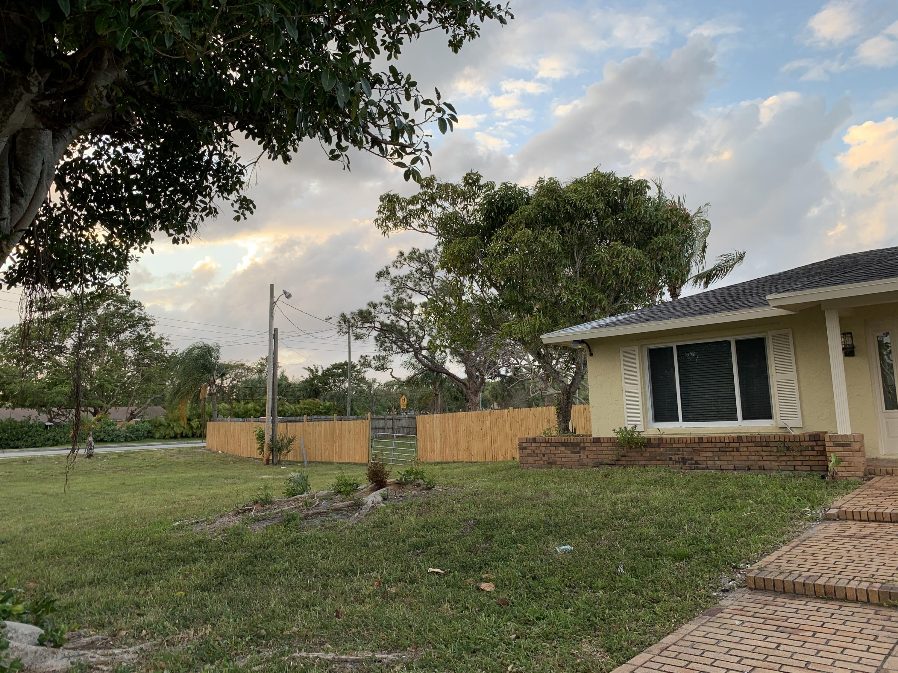 7086 Lawrence Road Boynton Beach, FL 33436 - Photo 2 of 16 IMG_1014