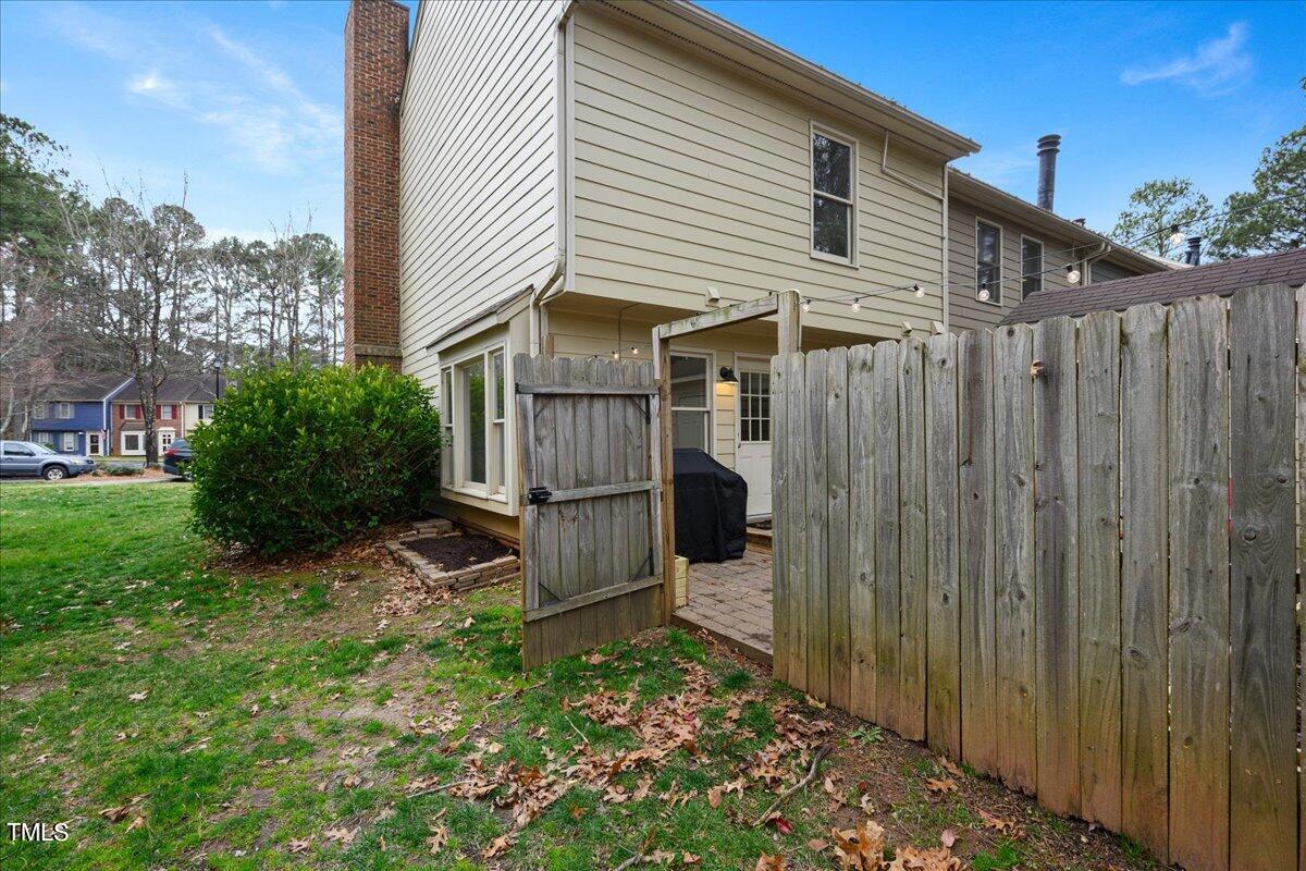 5662 Hamstead Crossing Raleigh, NC 27612 - Photo 31 of 31 Side yard and common HOA space.