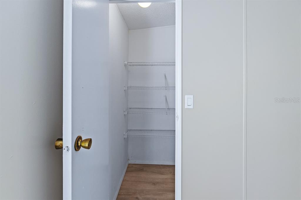 2828 Southwest Toronado Trail Stuart, FL 34997 - Photo 22 of 46 a view of walk in closet