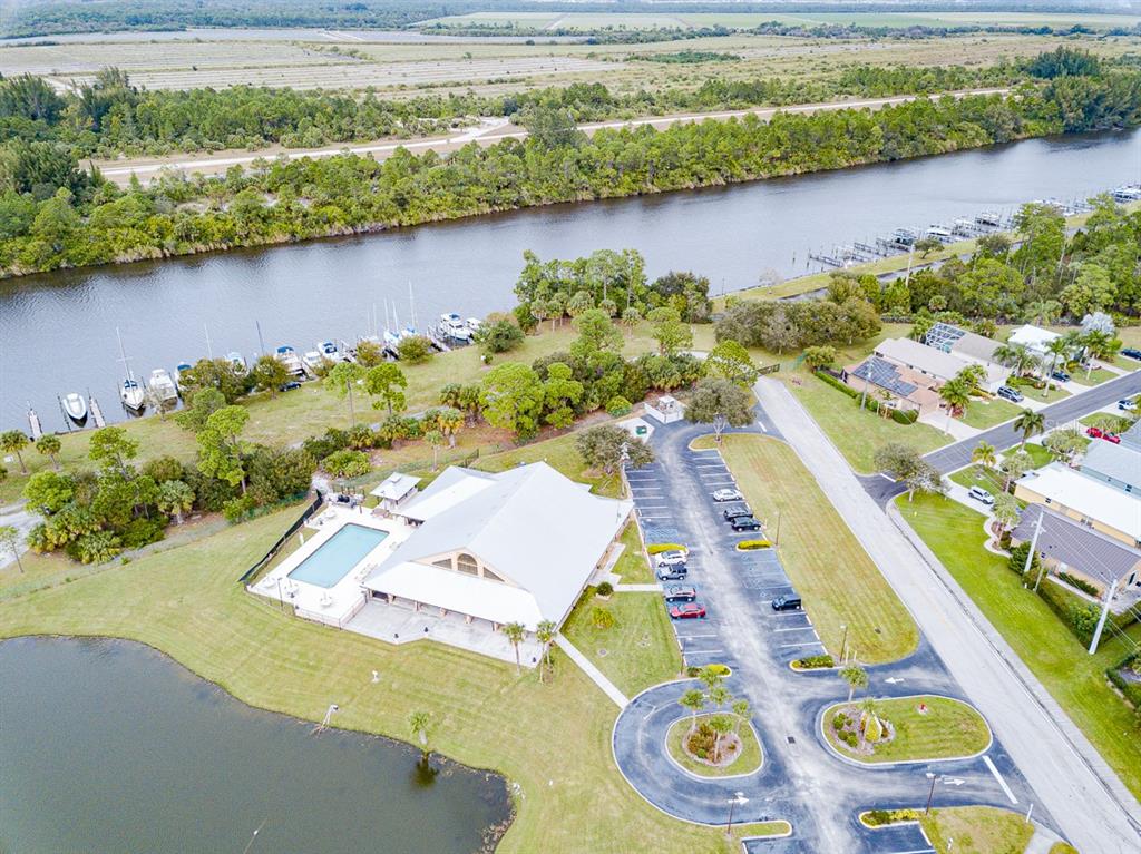 2828 Southwest Toronado Trail Stuart, FL 34997 - Photo 40 of 46 a view of an outdoor space and a lake view