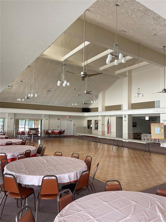 2828 Southwest Toronado Trail Stuart, FL 34997 - Photo 44 of 46 a outdoor dining space with furniture and kitchen view