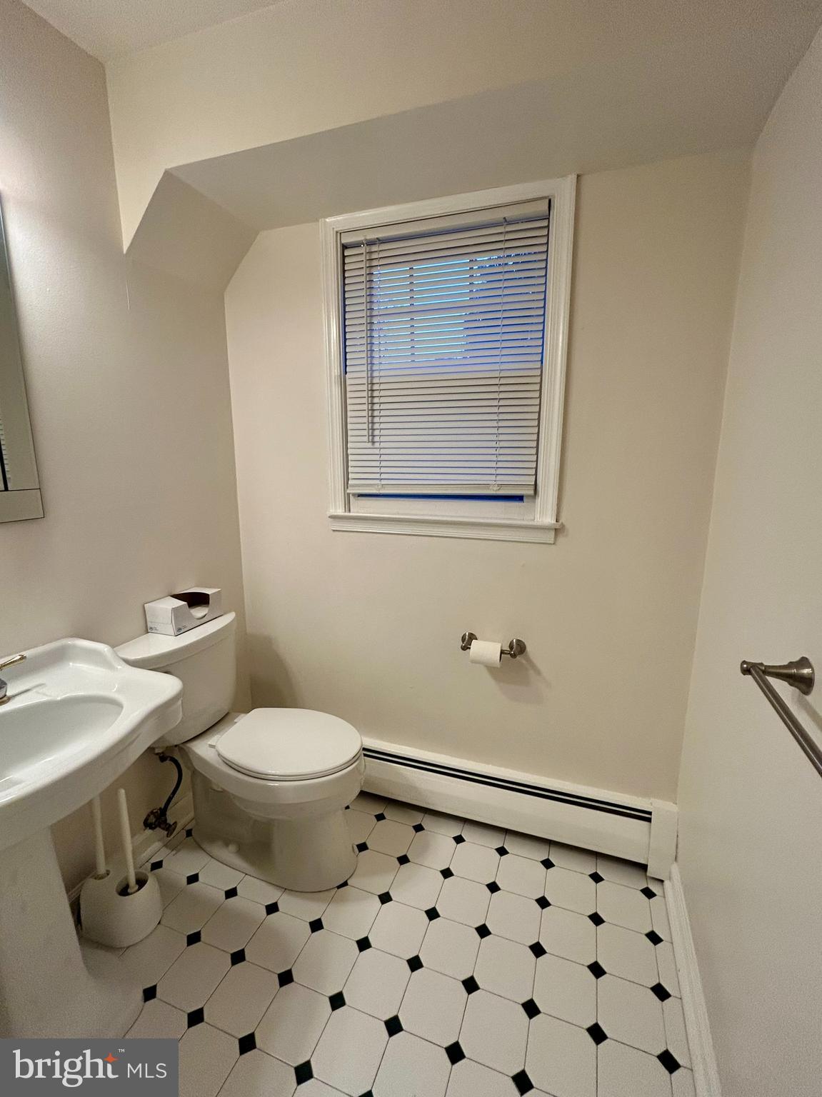 1007 Jones Road Conshohocken, PA 19428 - Photo 11 of 26 a bathroom with a sink toilet and shower