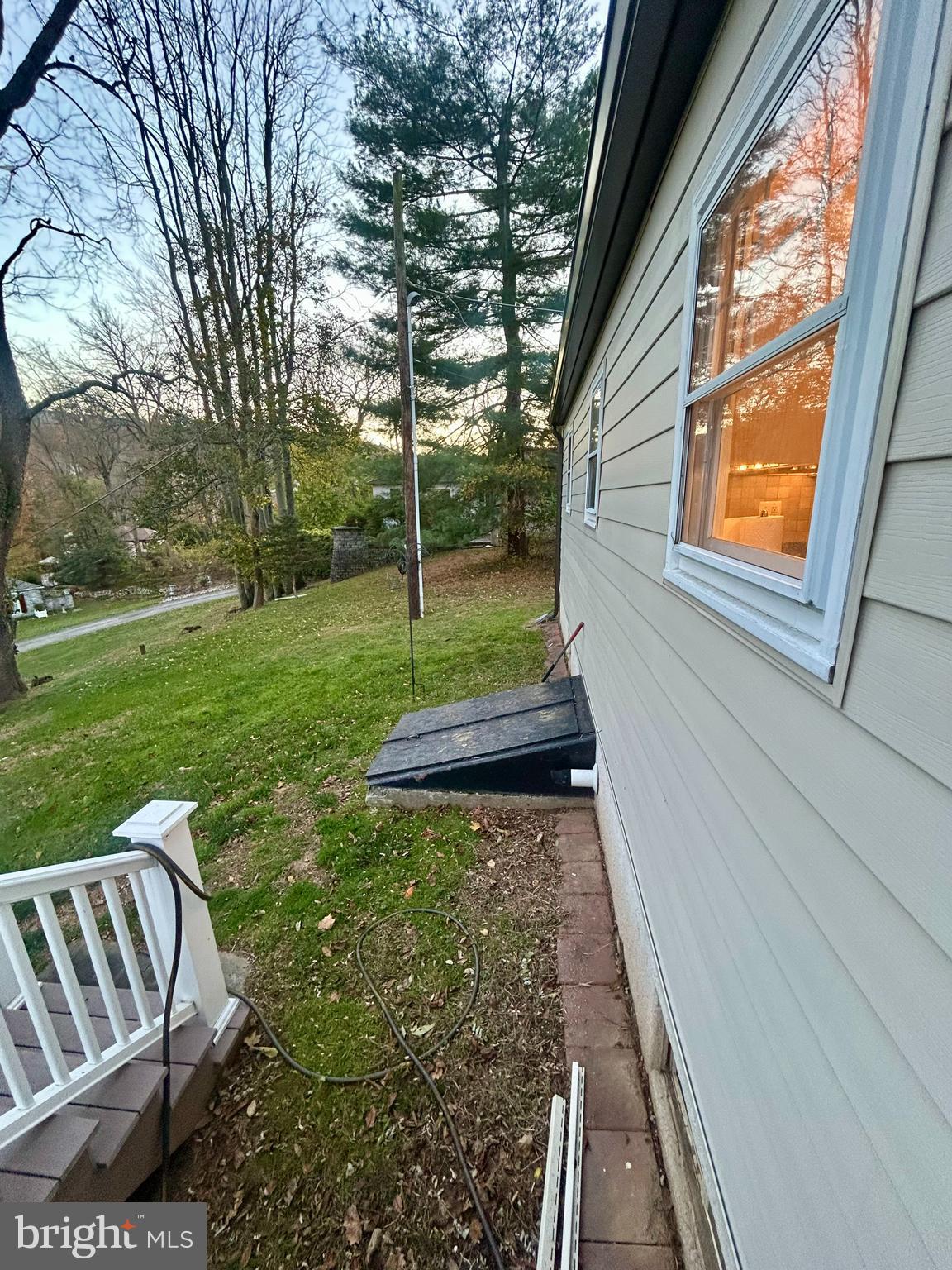 1007 Jones Road Conshohocken, PA 19428 - Photo 16 of 26 a view of a porch with furniture and garden