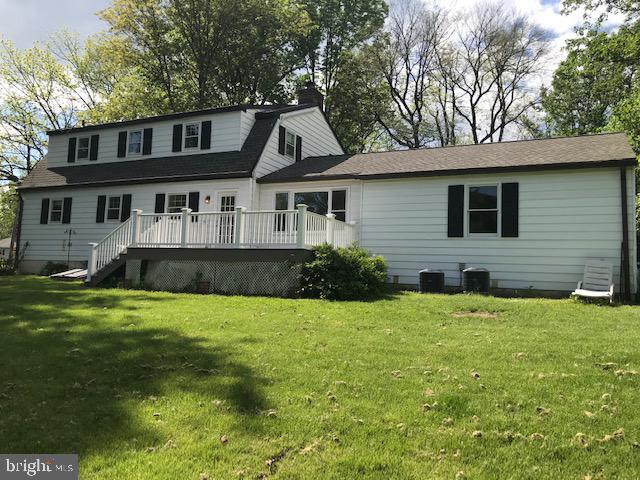 1007 Jones Road Conshohocken, PA 19428 - Photo 2 of 26 a front view of a house with a yard