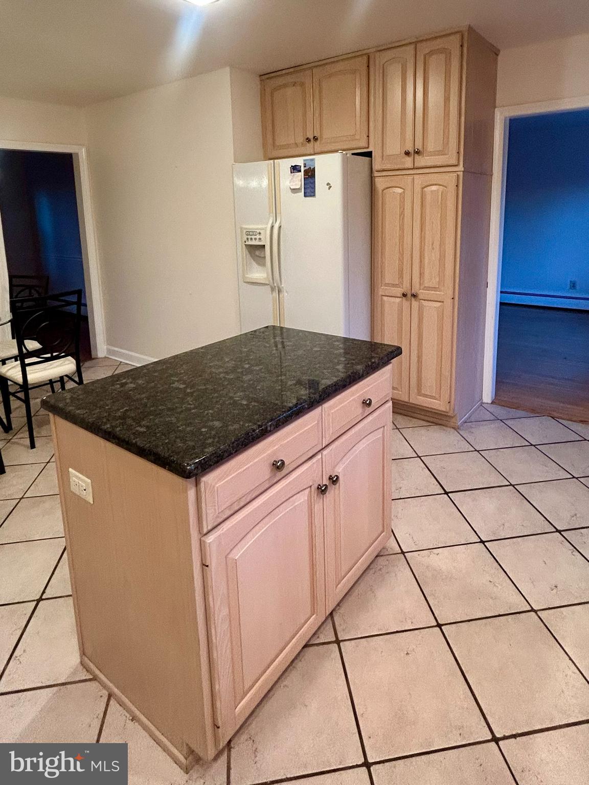1007 Jones Road Conshohocken, PA 19428 - Photo 8 of 26 a kitchen with stainless steel appliances granite countertop a refrigerator sink and cabinets