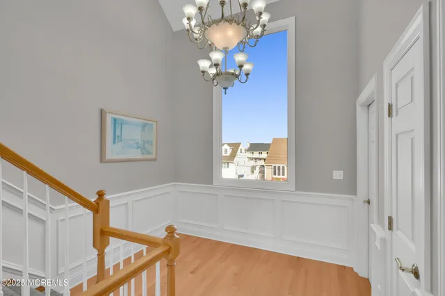 a spacious bedroom with a large bed and a window