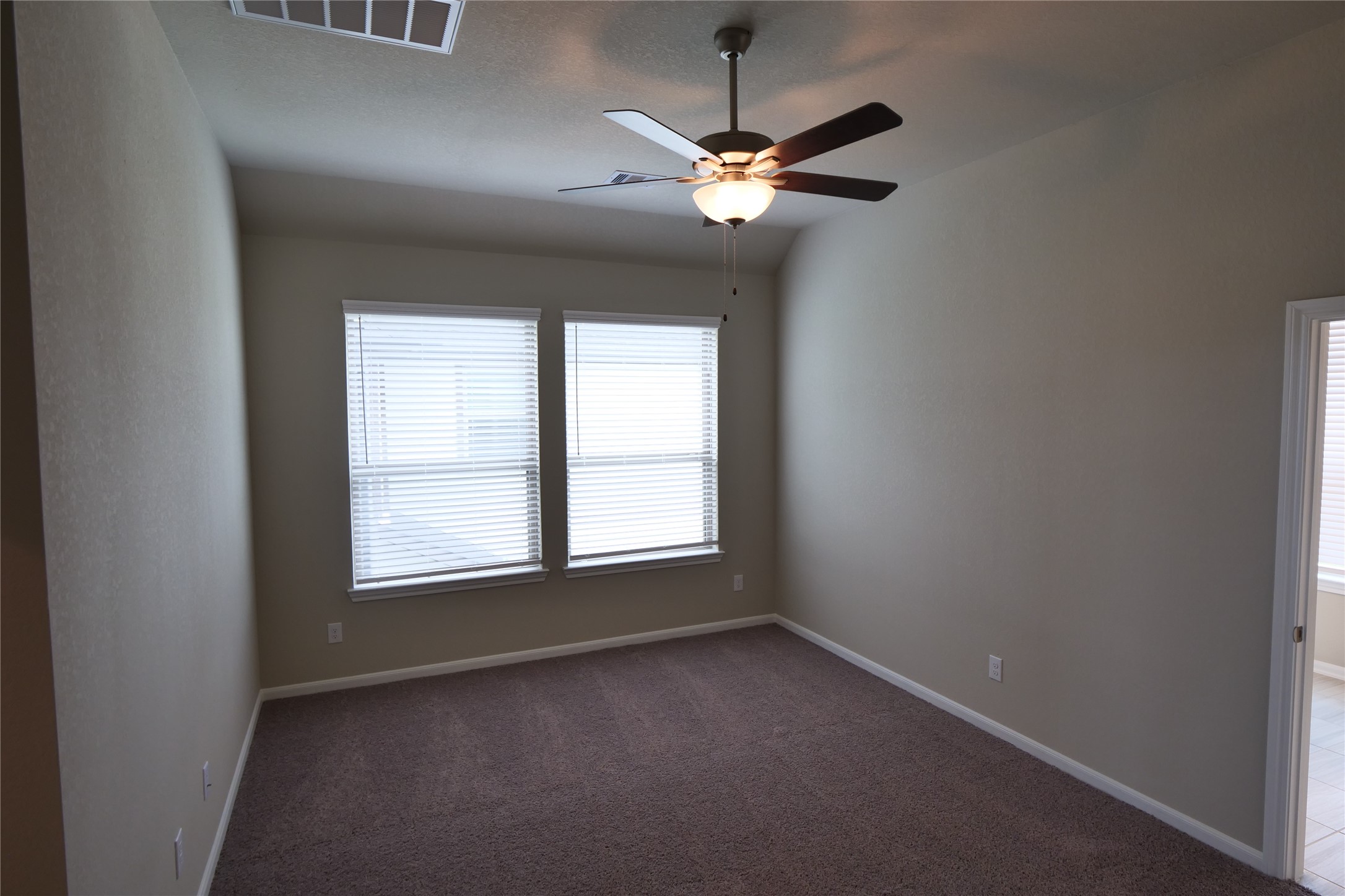 5110 Prairie Terrace Fulshear, TX 77441 - Photo 16 of 31 an empty room with a window and a fan