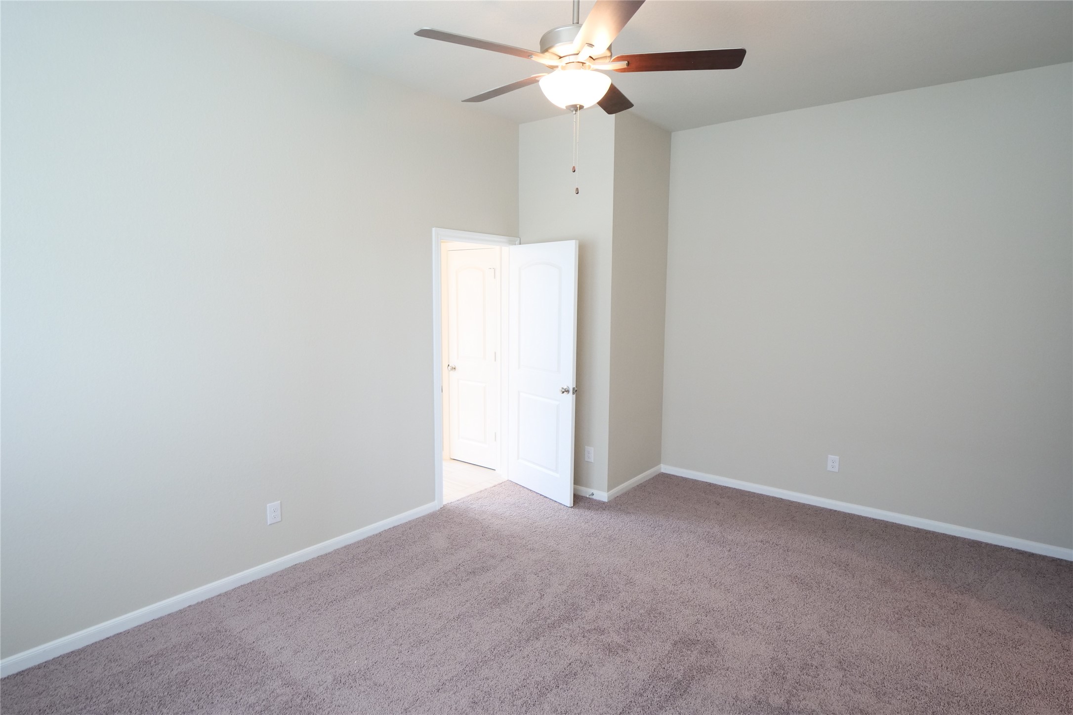 5110 Prairie Terrace Fulshear, TX 77441 - Photo 17 of 31 an empty room with a fan & a window