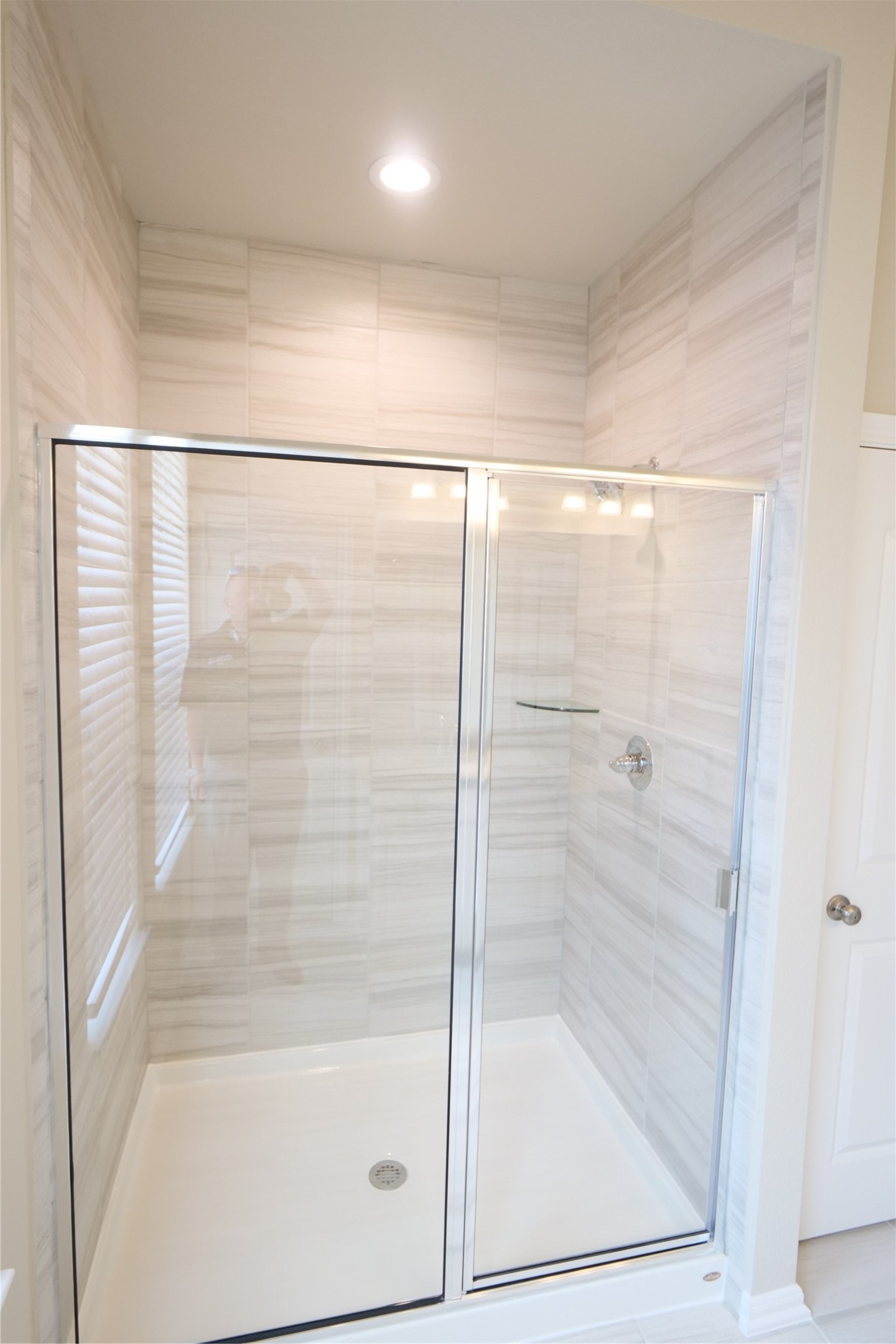 5110 Prairie Terrace Fulshear, TX 77441 - Photo 21 of 31 a bathroom with a glass shower door