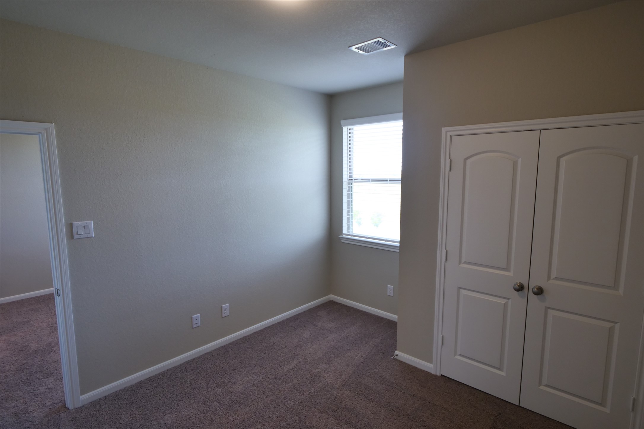 5110 Prairie Terrace Fulshear, TX 77441 - Photo 25 of 31 an empty room with windows