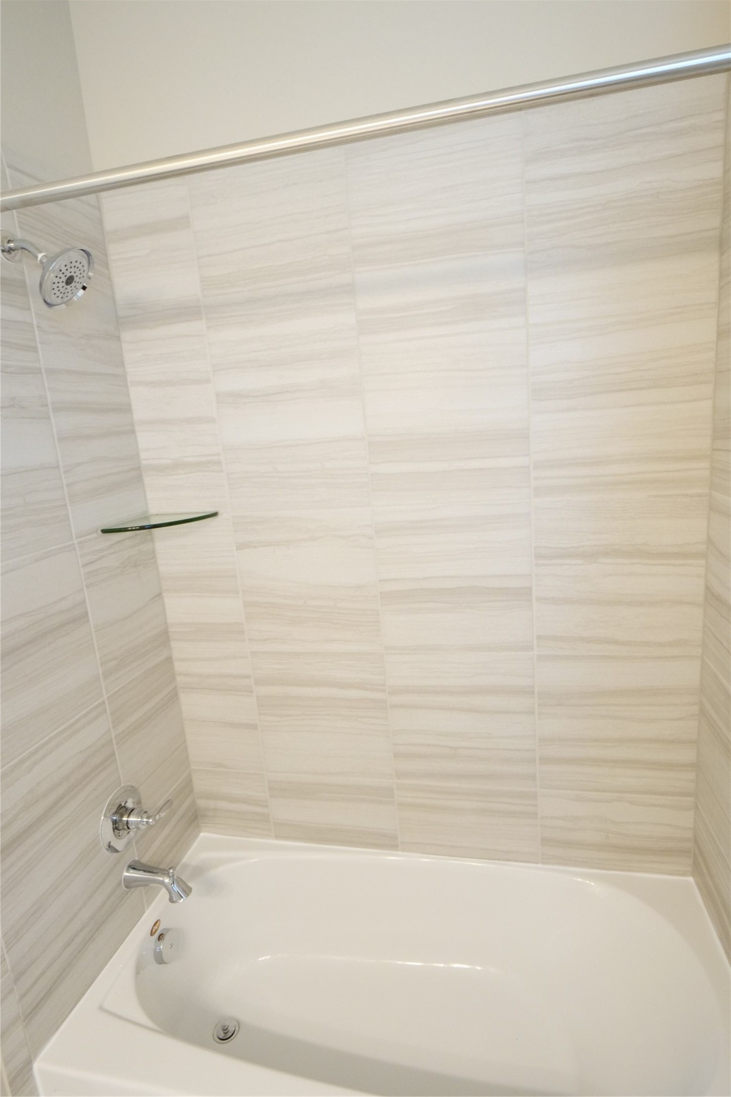 5110 Prairie Terrace Fulshear, TX 77441 - Photo 27 of 31 a bathroom with a shower and a bath tub